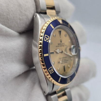 Submariner Date automatic luxury watch with champagne dial and two-tone bracelet