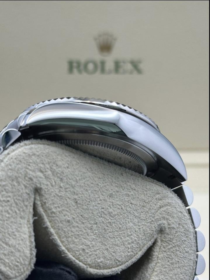 Sky-Dweller automatic luxury watch with black dial and Jubilee bracelet