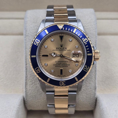 Submariner Date automatic luxury watch with champagne dial and two-tone bracelet