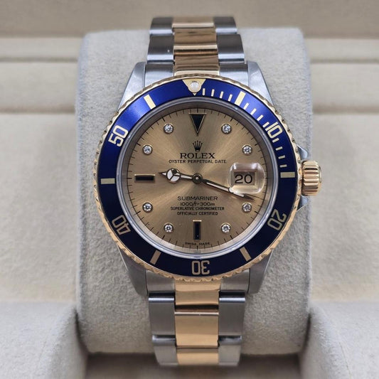 Submariner Date automatic luxury watch with champagne dial and two-tone bracelet