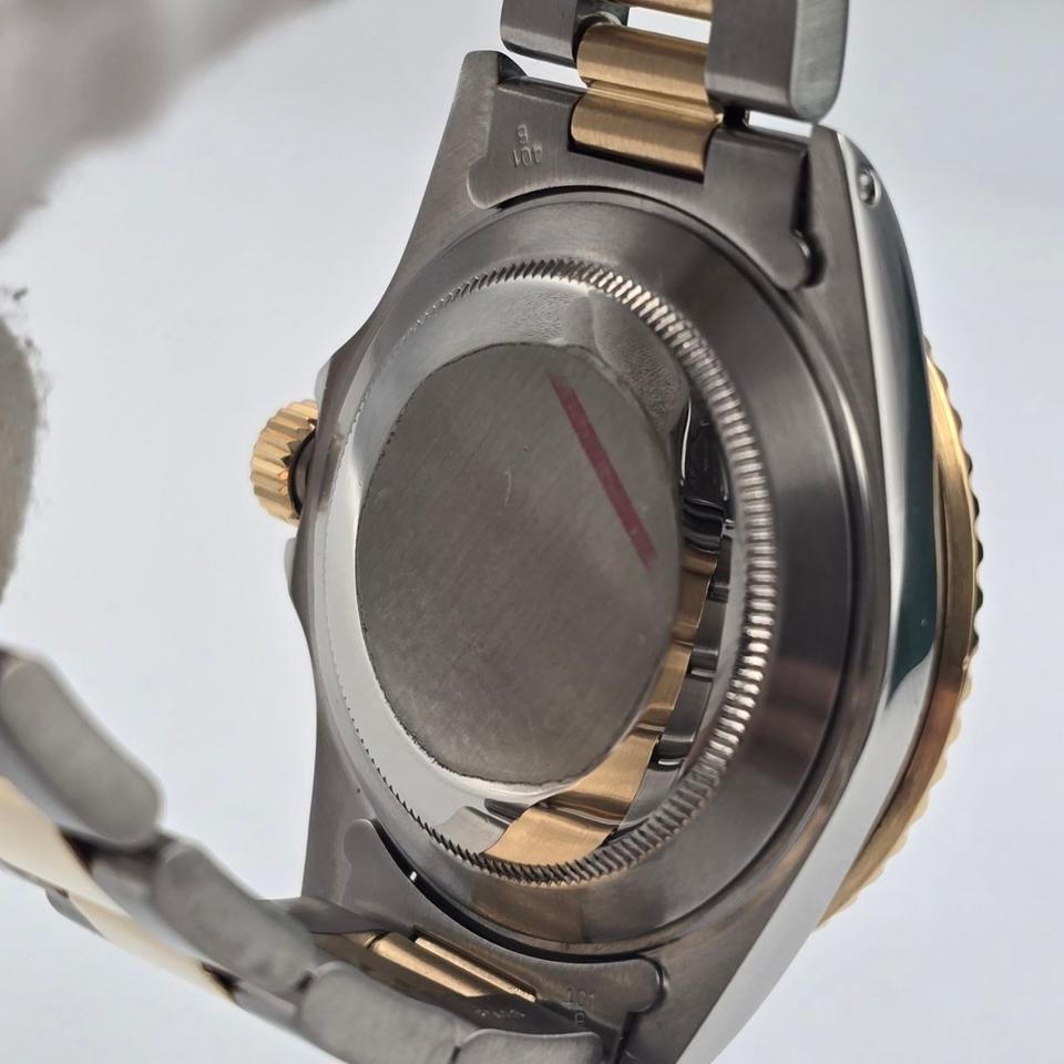 Submariner Date automatic luxury watch with champagne dial and two-tone bracelet