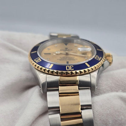 Submariner Date automatic luxury watch with champagne dial and two-tone bracelet