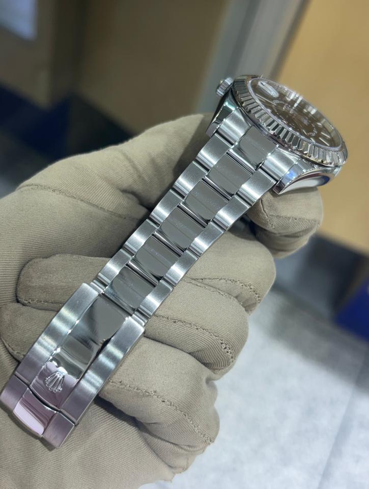 Rolex Sky-Dweller automatic luxury watch with black dial