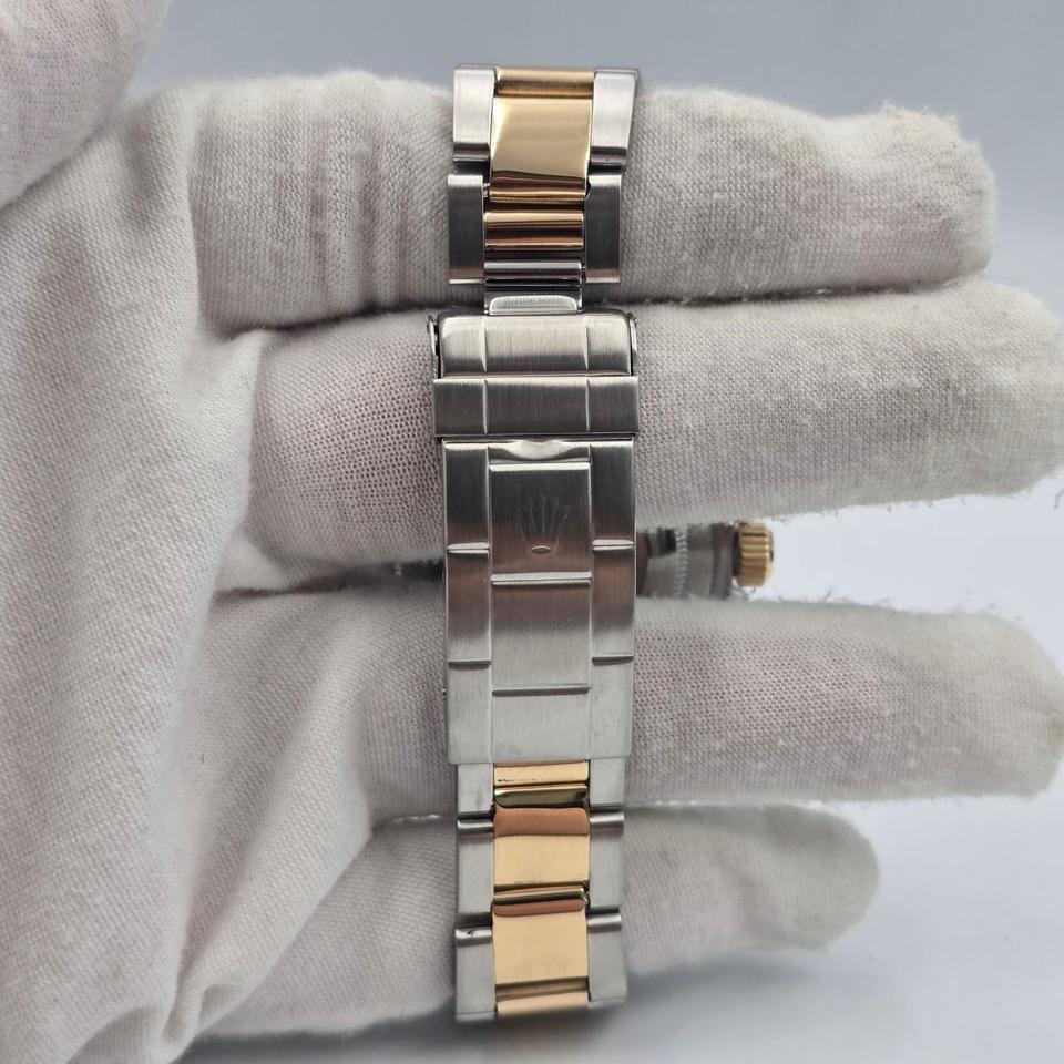 Submariner Date automatic luxury watch with champagne dial and two-tone bracelet