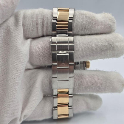 Submariner Date automatic luxury watch with champagne dial and two-tone bracelet